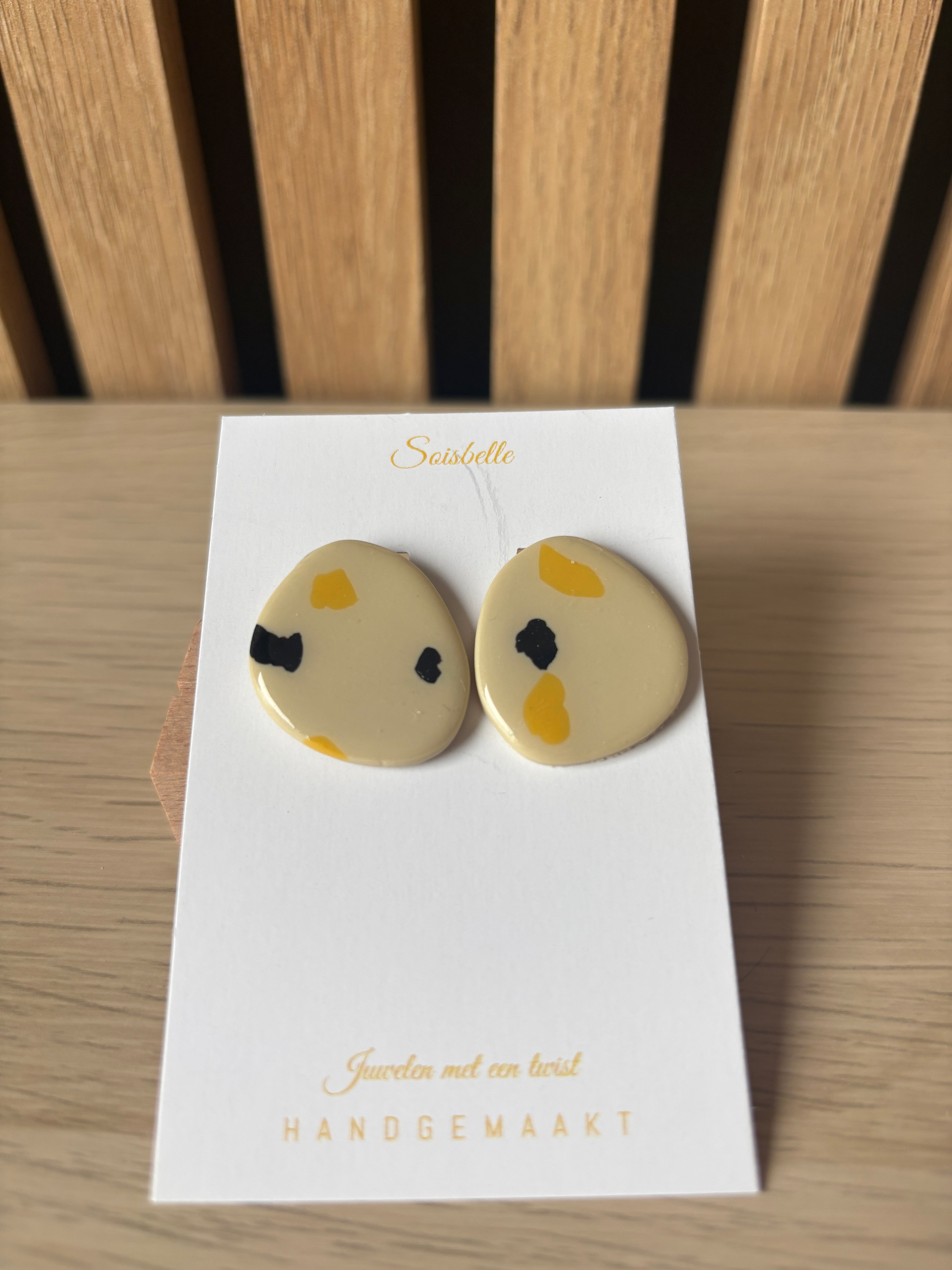 Beau beige gevlekt zwart/geel